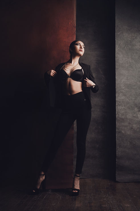 Woman in black bra and pants, fashion portrait
