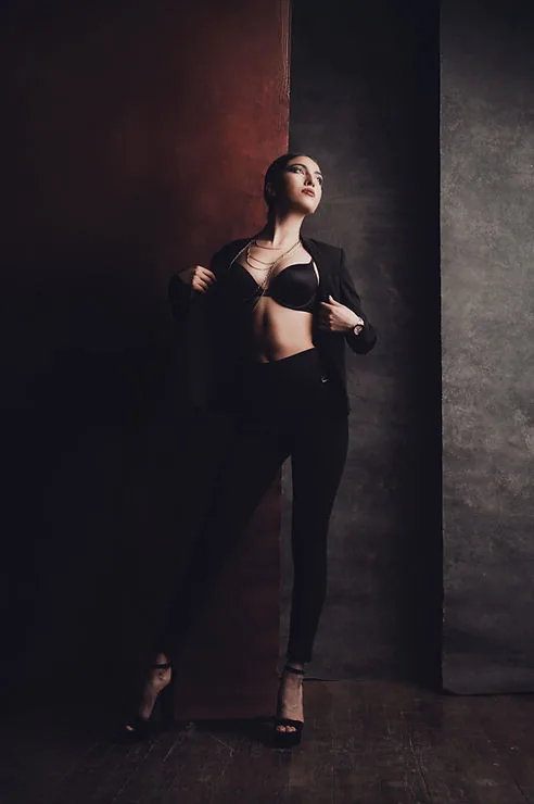 Woman in black bra and pants, fashion portrait
