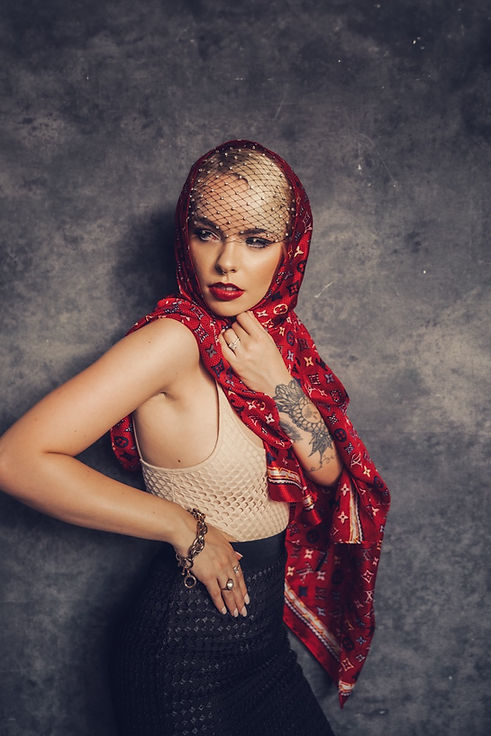 Fashion portrait: Woman in red headscarf