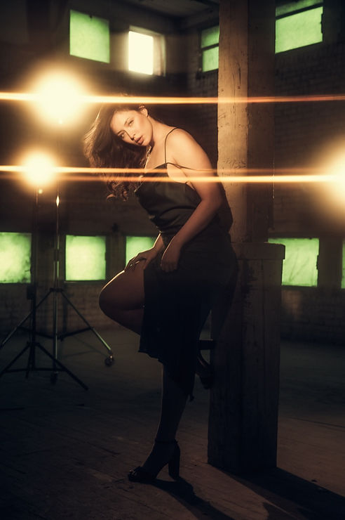 Woman in short black dress, fashion portrait