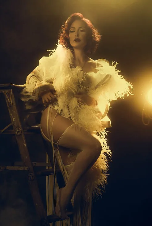 Woman in vintage fashion portrait, glamorous pose
