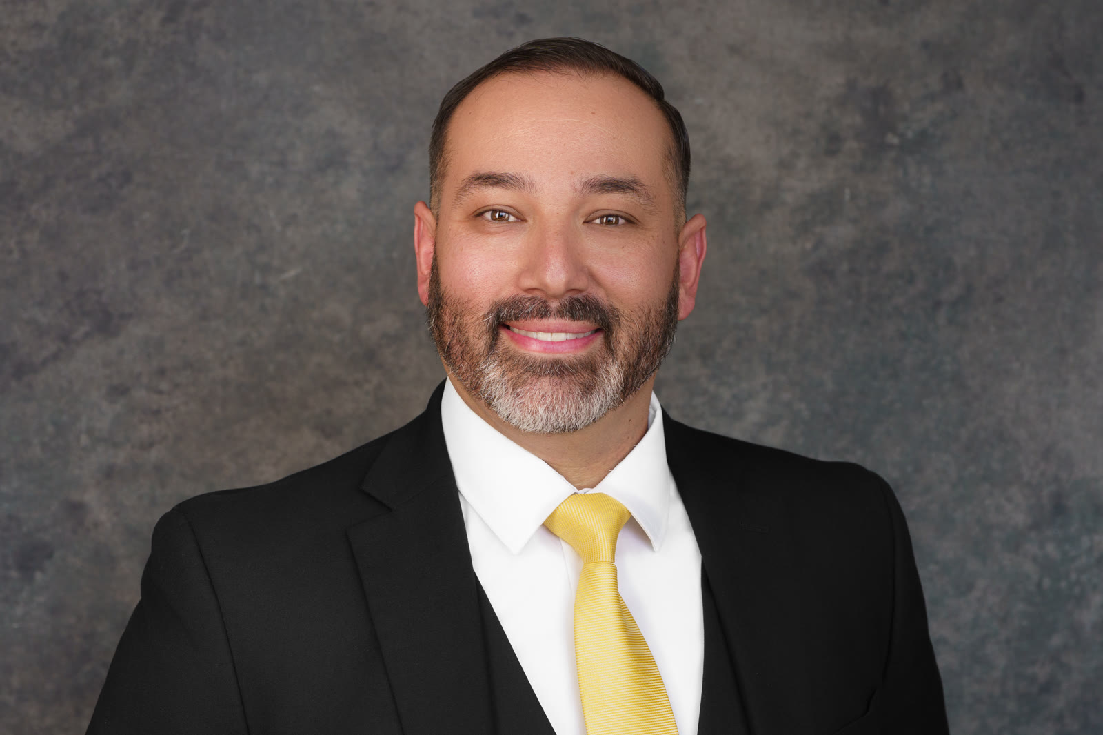 Executive portrait photographed by Jordan Licon for a corporate team page
