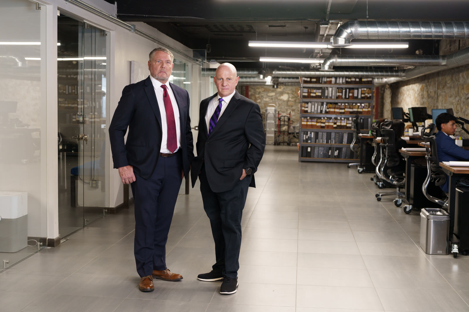 Business partners photographed by Jordan Licon in an office portrait session