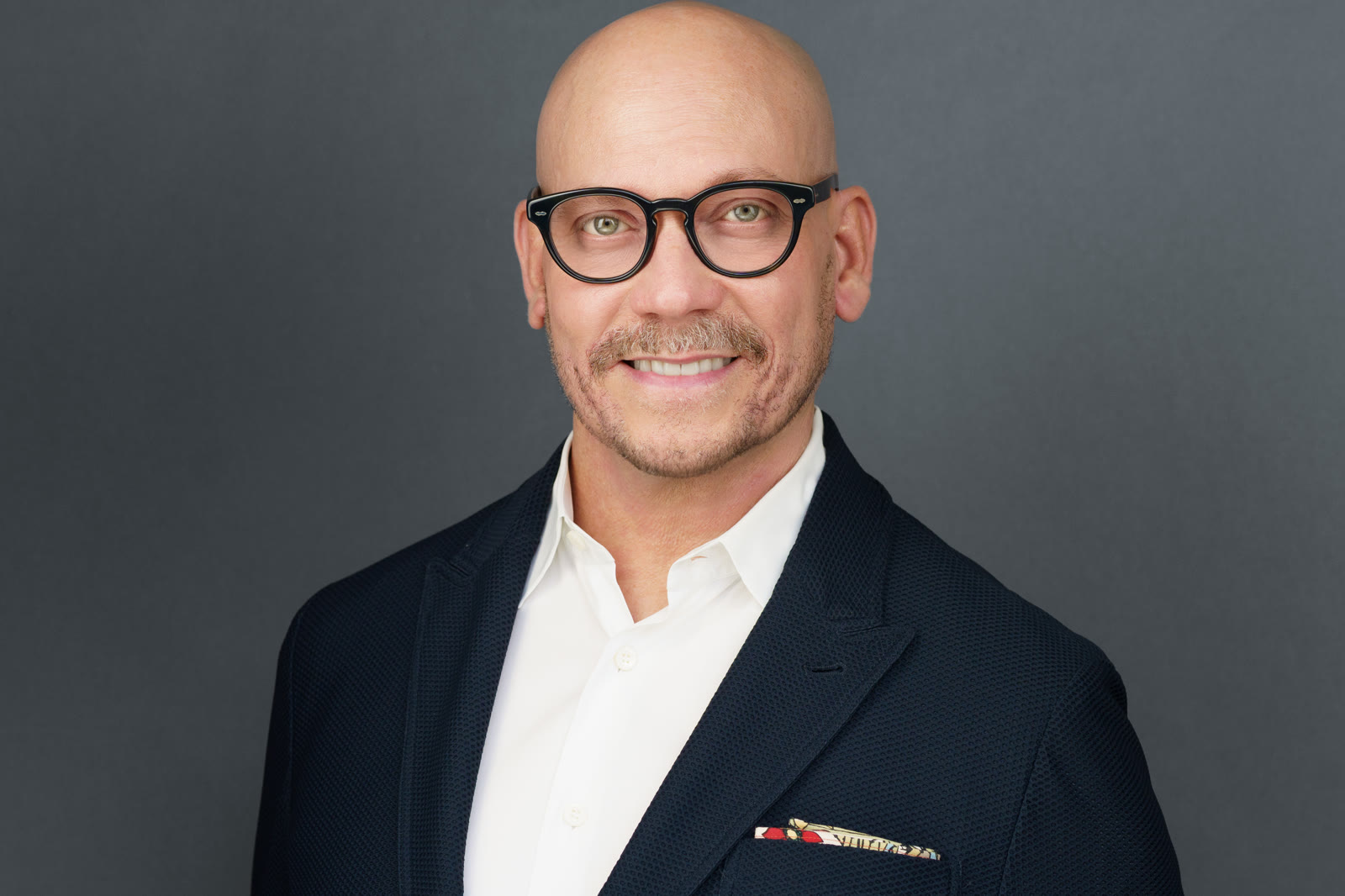Executive headshot photographed by Jordan Licon