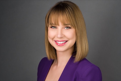 Professional headshot of a blonde woman in a blazer by Jordan Licon